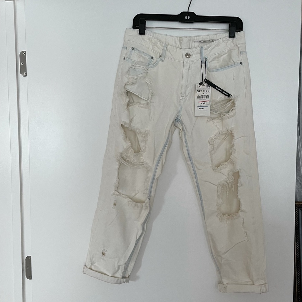 ISO: White Distressed denim jeans